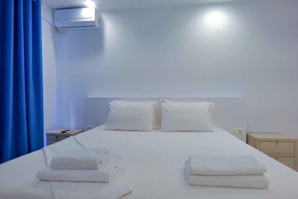 Postel nebo postele na pokoji v ubytování Sea View Hotel
