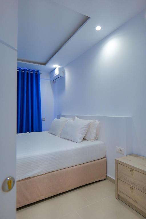 Postel nebo postele na pokoji v ubytování Sea View Hotel
