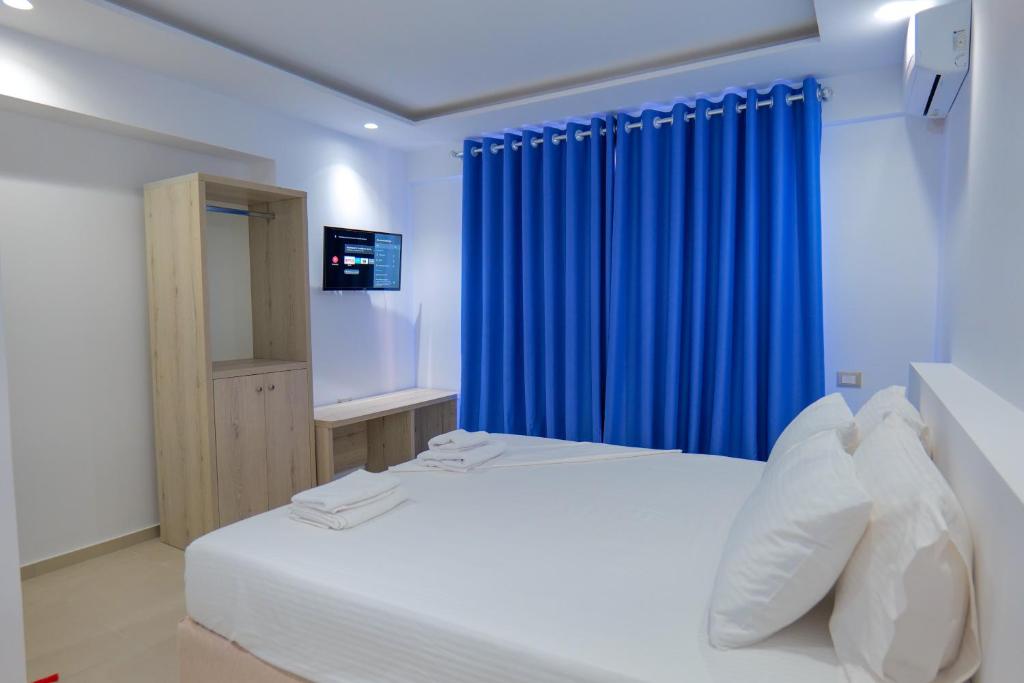 Postel nebo postele na pokoji v ubytování Sea View Hotel