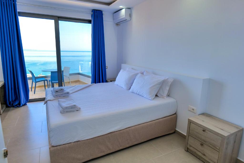 Postel nebo postele na pokoji v ubytování Sea View Hotel