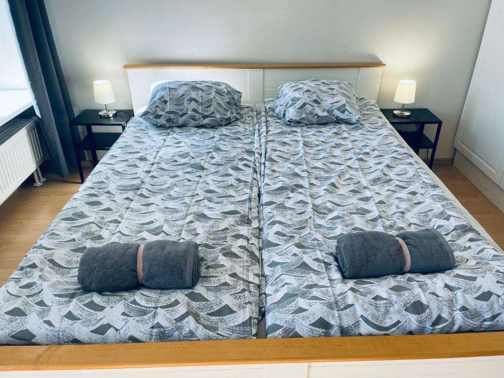 Postel nebo postele na pokoji v ubytování Tallinn Seaside Apartment