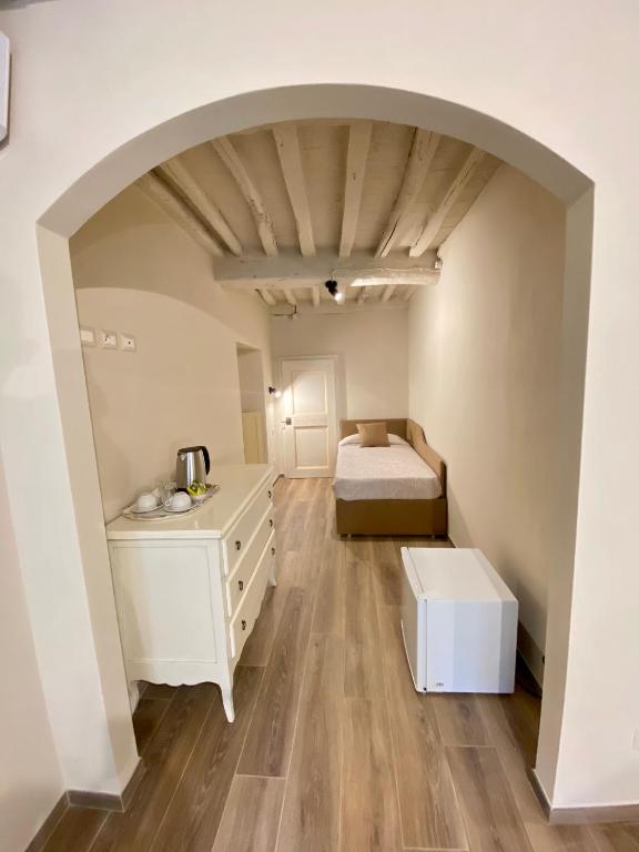Posteľ alebo postele v izbe v ubytovaní Casa Ambra