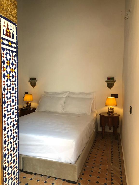 Ένα ή περισσότερα κρεβάτια σε δωμάτιο στο Riad Majorelle