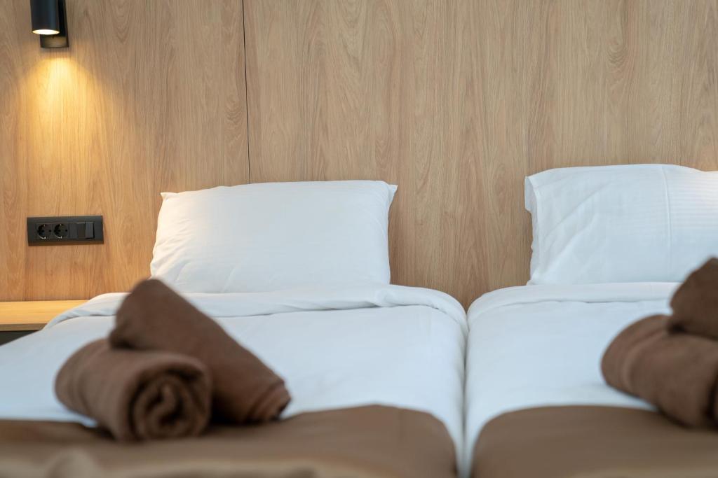 Postel nebo postele na pokoji v ubytování Lago Hotel