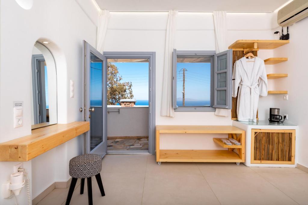 Voodi või voodid majutusasutuse Hotel Thira toas