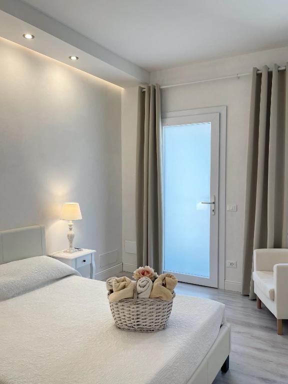 Postel nebo postele na pokoji v ubytování Villa Pensione Mercedes
