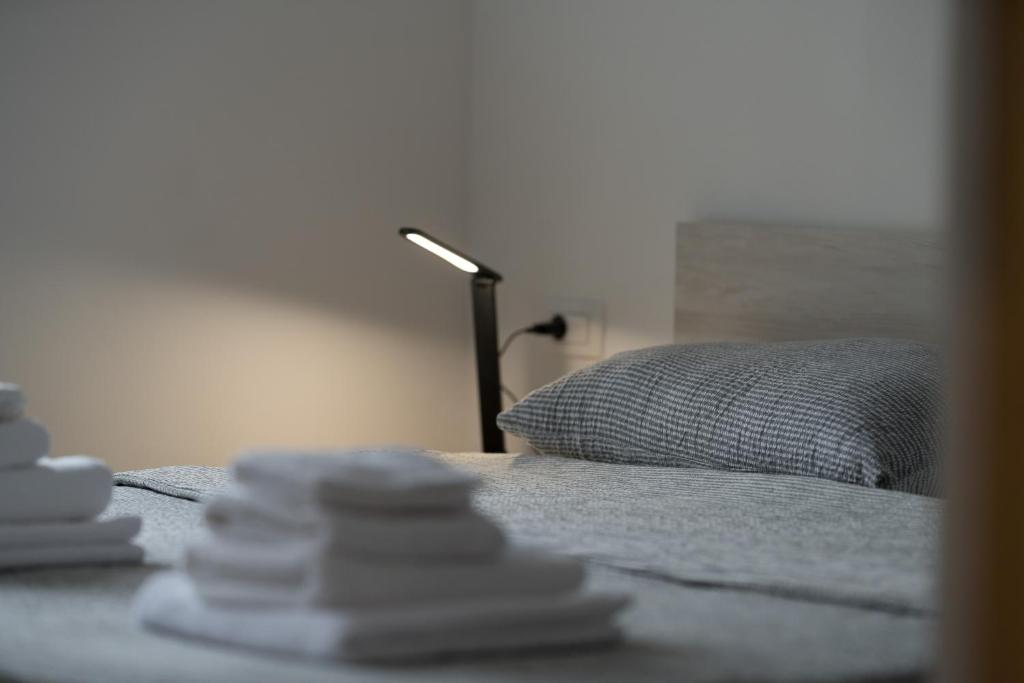Postel nebo postele na pokoji v ubytování Apartmani Villa Ruby