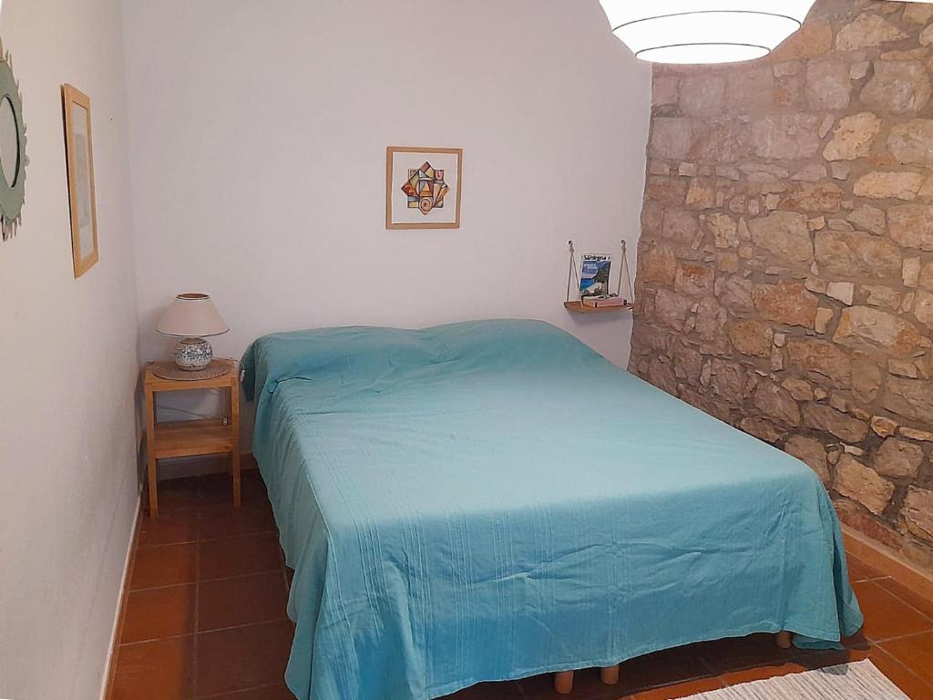 Postel nebo postele na pokoji v ubytování Sa Mannalissa casa vacanza