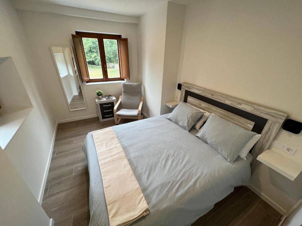 Postel nebo postele na pokoji v ubytování Palacio de Cambre