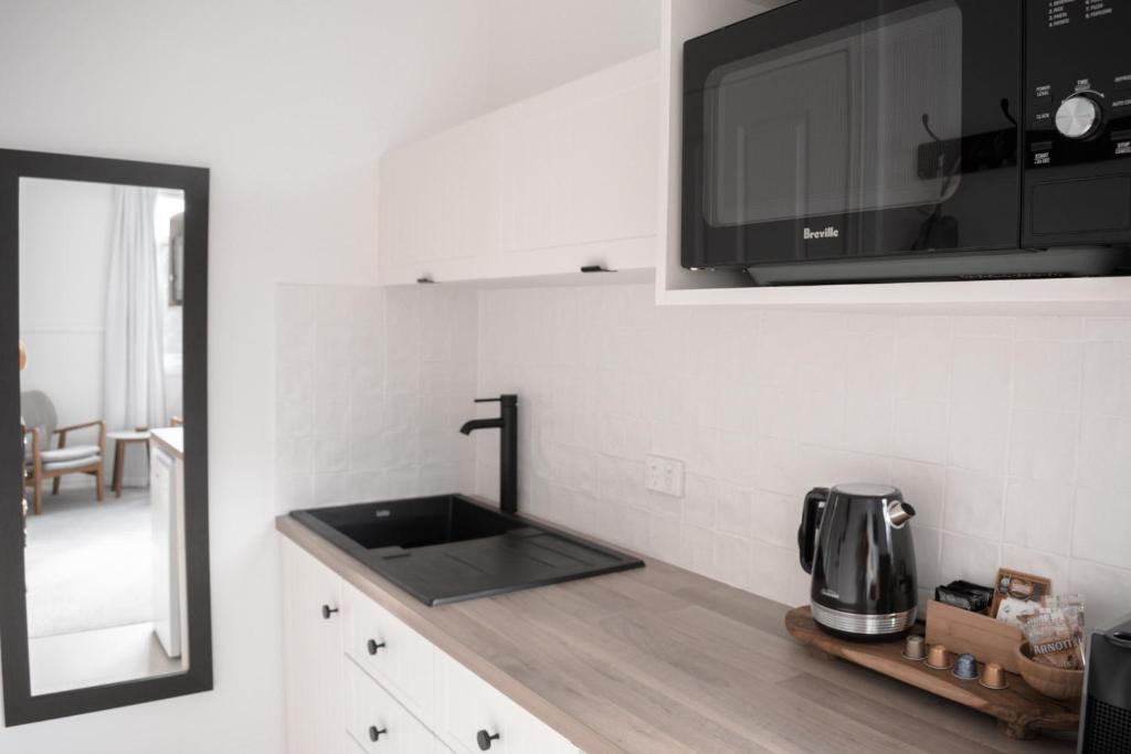 Kuchyň nebo kuchyňský kout v ubytování Walton House