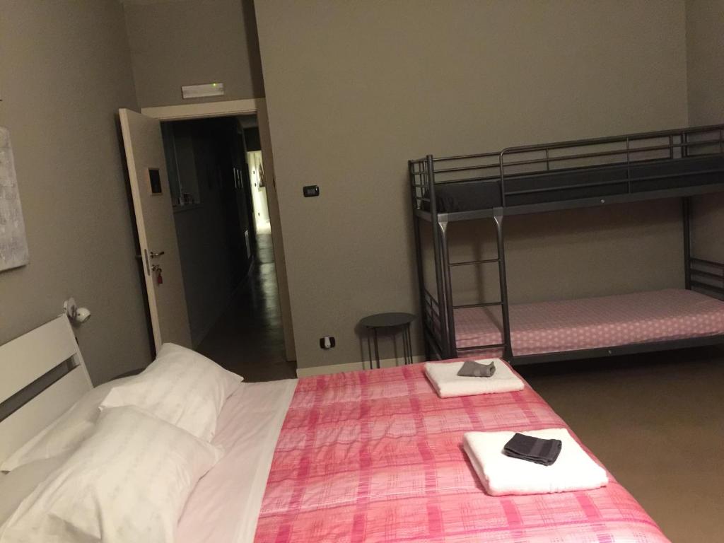 Postel nebo postele na pokoji v ubytování B&B Aurora