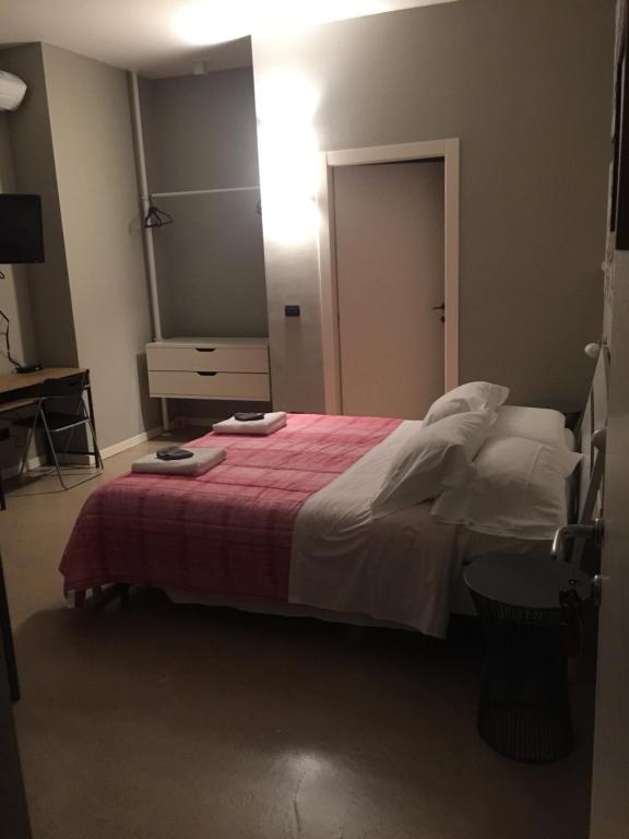 Postel nebo postele na pokoji v ubytování B&B Aurora