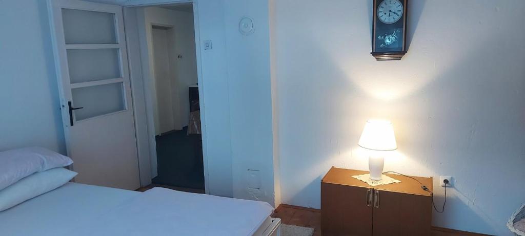 Postel nebo postele na pokoji v ubytování Apartman Paje