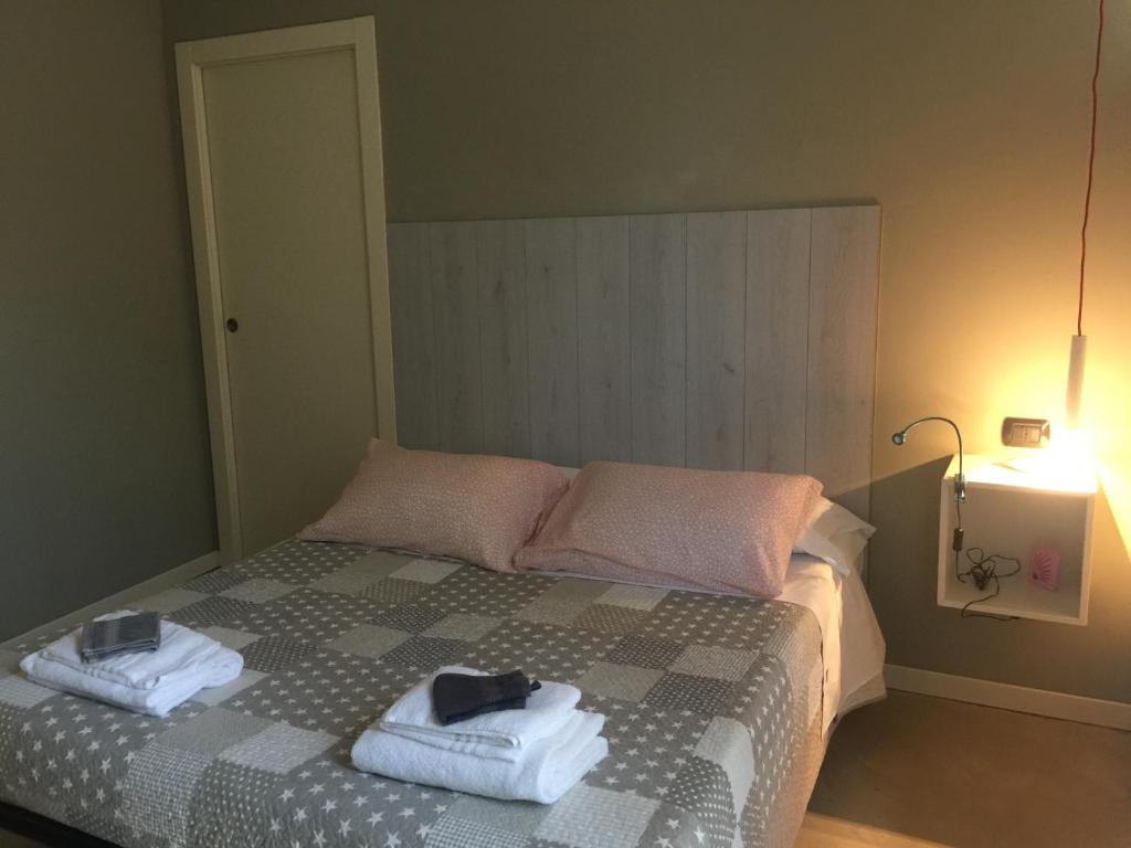 Postel nebo postele na pokoji v ubytování B&B Aurora