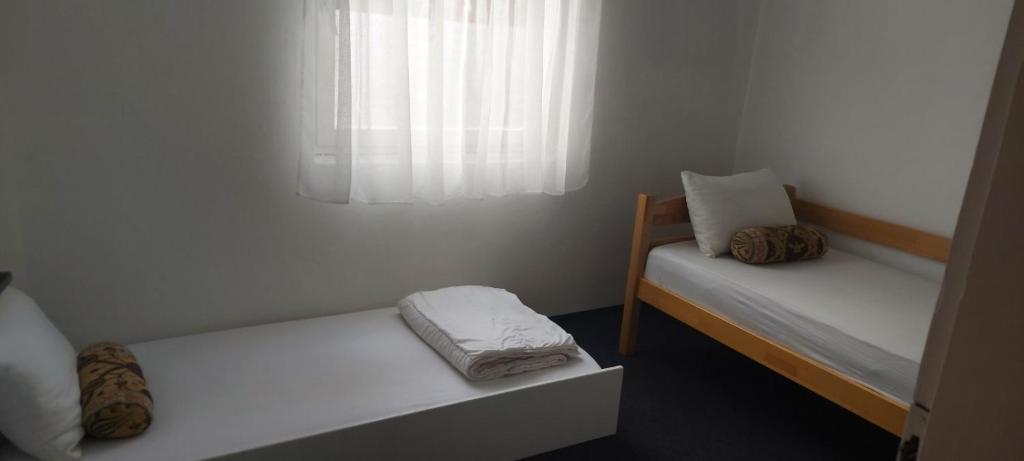 Postel nebo postele na pokoji v ubytování Apartman Paje