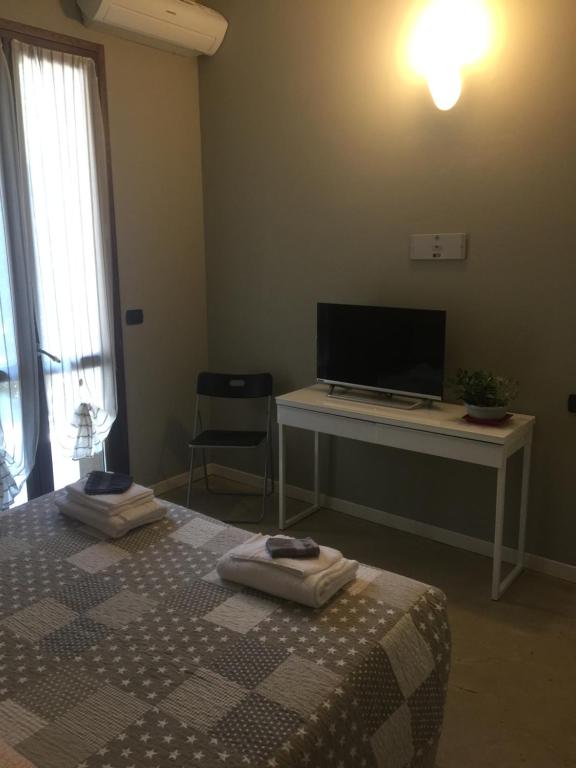 TV a/nebo společenská místnost v ubytování B&B Aurora