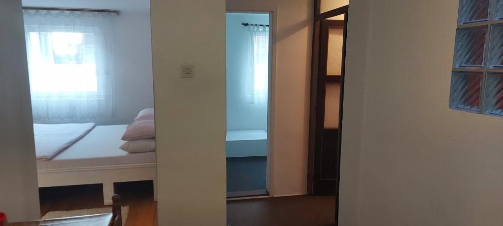 Postel nebo postele na pokoji v ubytování Apartman Paje