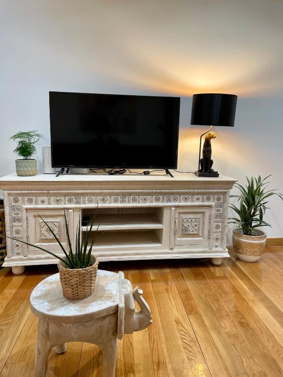 A television and/or entertainment centre at A Das Marias GALLERY