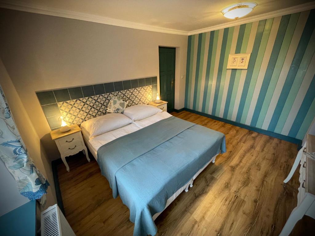 Postel nebo postele na pokoji v ubytování TGM Apartments