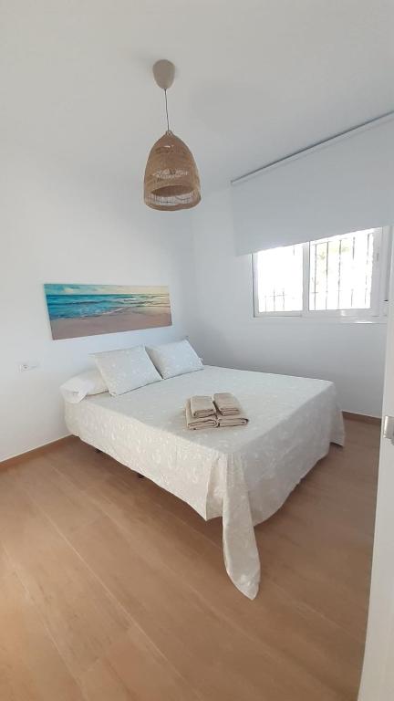 Posteľ alebo postele v izbe v ubytovaní Apartamento Alegría