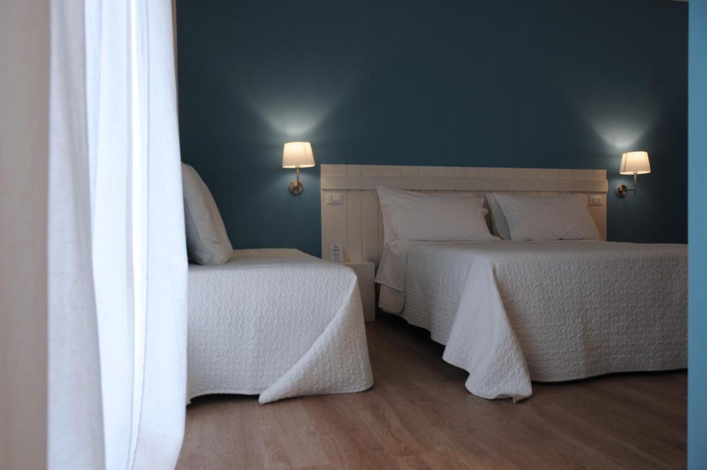 Postel nebo postele na pokoji v ubytování B&B Medinblu