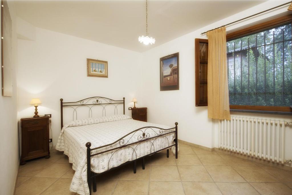 Postel nebo postele na pokoji v ubytování Il Chicco d'Oro