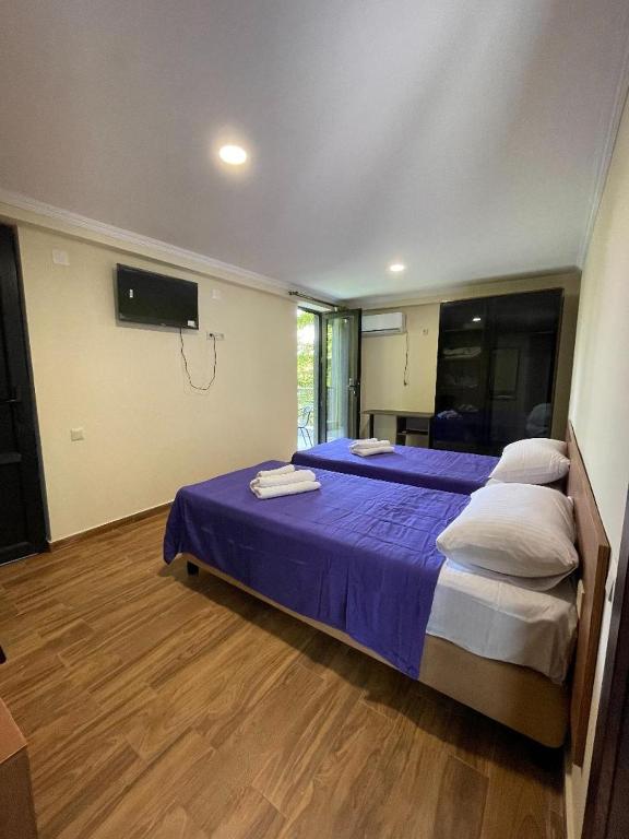 Postel nebo postele na pokoji v ubytování Villa Story Hotel