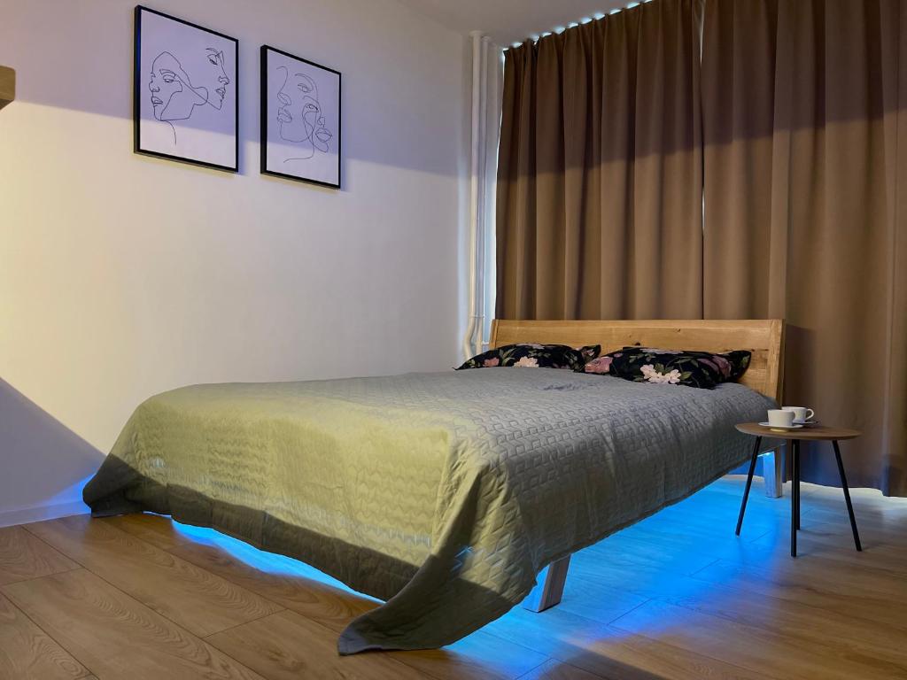 Postel nebo postele na pokoji v ubytování ne-doma