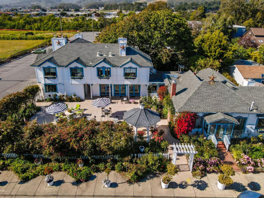 an aerial view of a house with a garden at Mill Rose Inn in Half Moon Bay