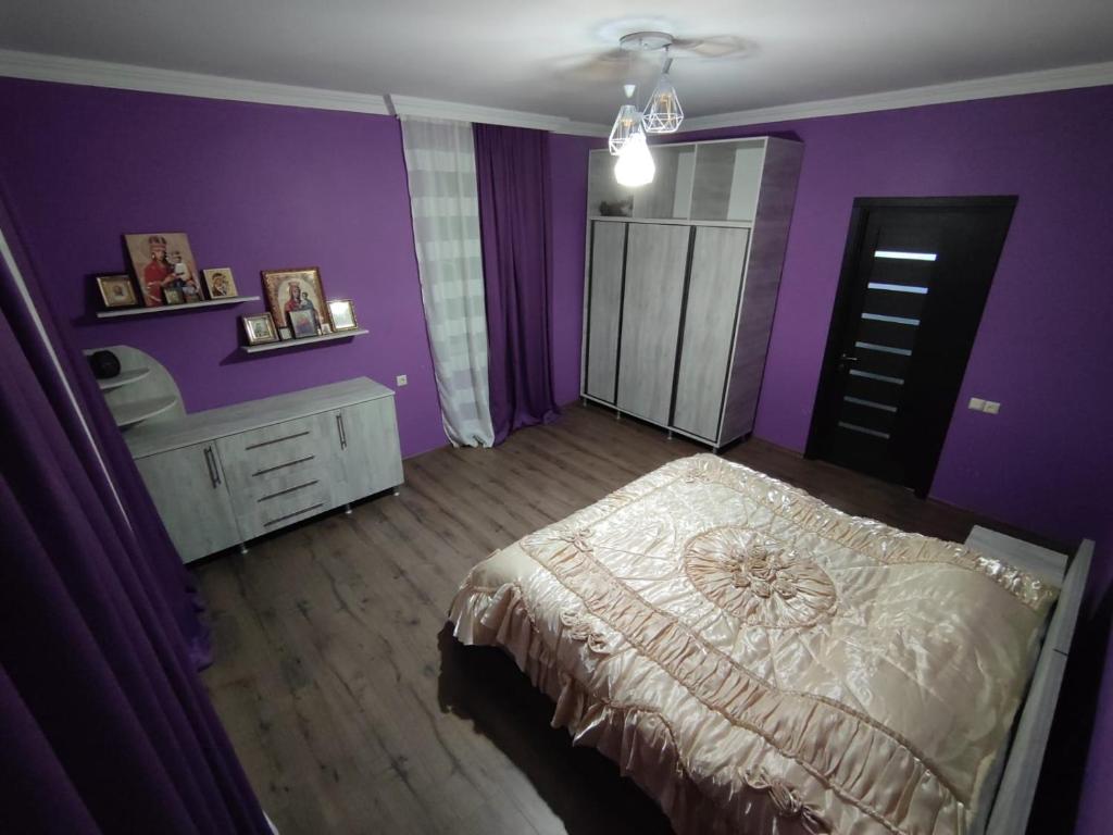 Postel nebo postele na pokoji v ubytování Guest House MARTA