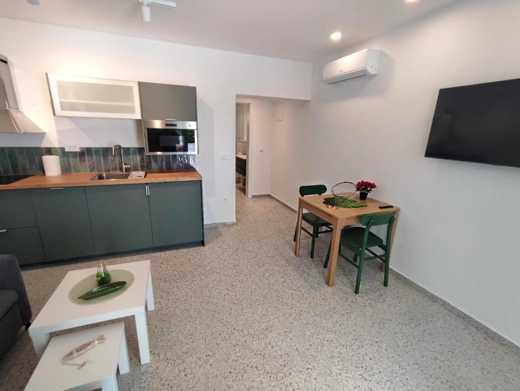 Kuchyň nebo kuchyňský kout v ubytování GaLa Apartments Zaostrog