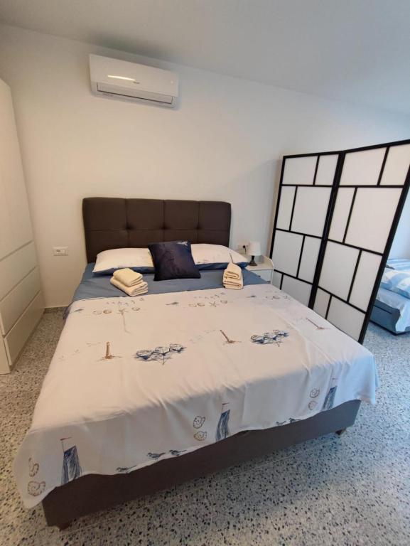 Postel nebo postele na pokoji v ubytování GaLa Apartments Zaostrog