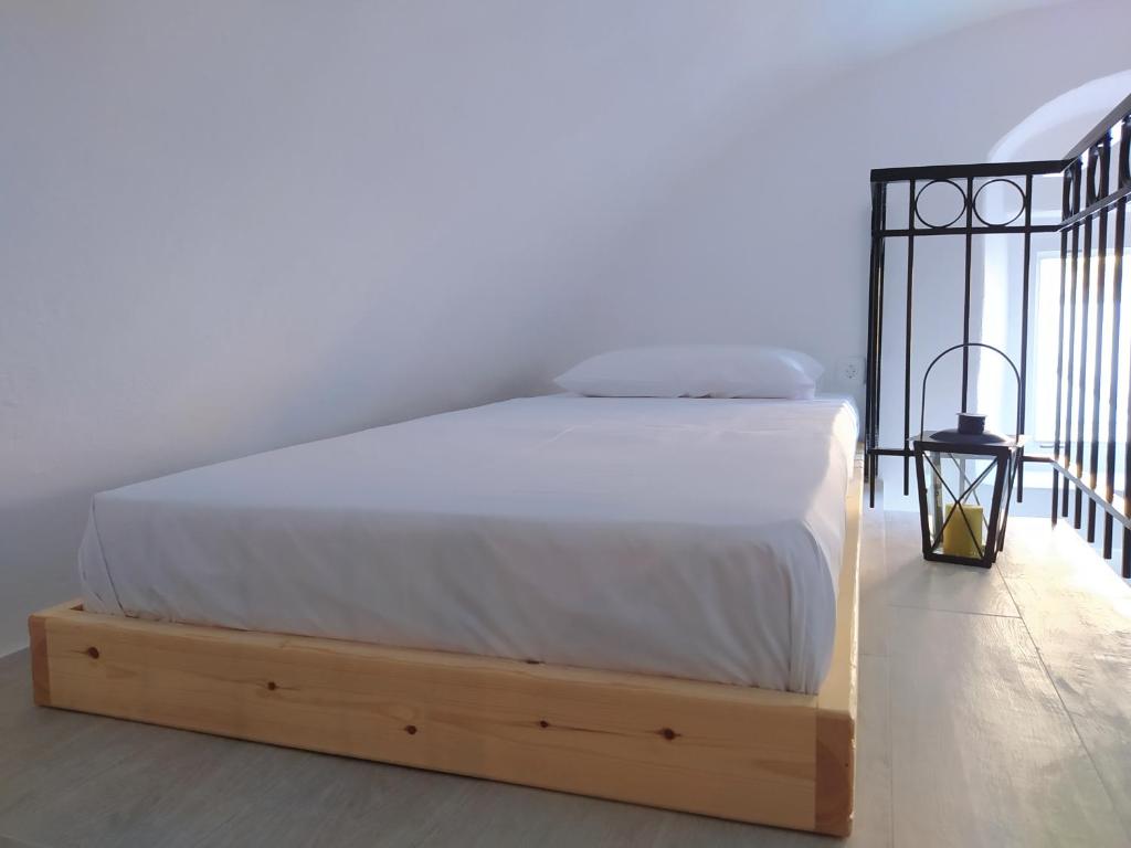 Postel nebo postele na pokoji v ubytování Mentoras' Complex