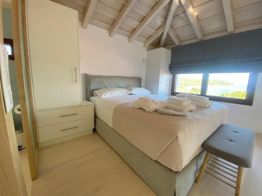 Postel nebo postele na pokoji v ubytování Magic Hotel