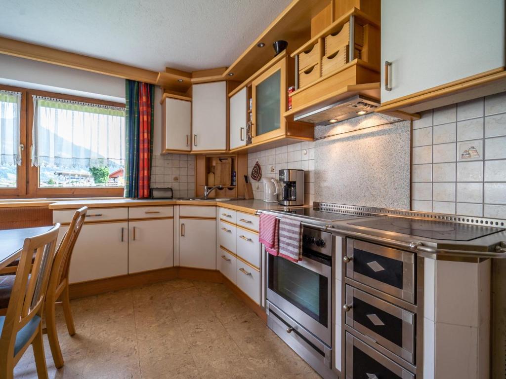 Kuchyň nebo kuchyňský kout v ubytování Ferienhaus Schlitters