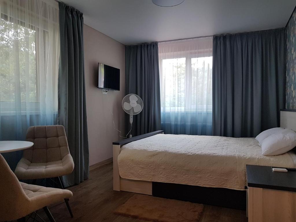 Postel nebo postele na pokoji v ubytování Zelena Sadyba