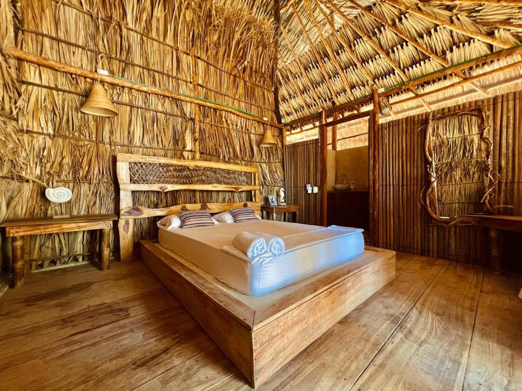 Postel nebo postele na pokoji v ubytování Mistica Island Hostel - Isla Palma