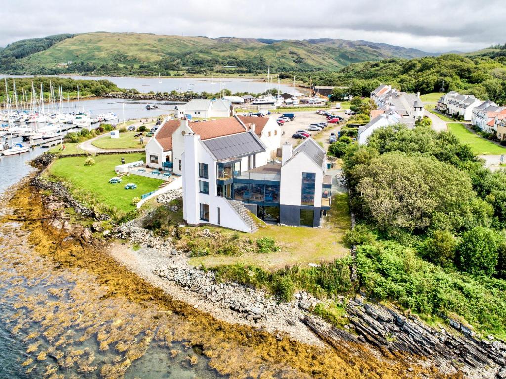 an aerial view of a small town with a marina at Haven House in Lochgilphead