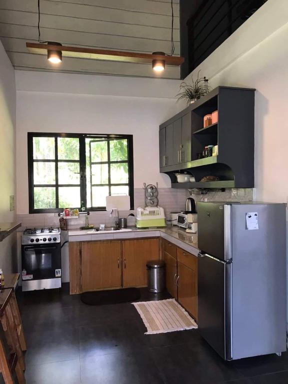 Kuchyň nebo kuchyňský kout v ubytování Laguna Loft Camiguin