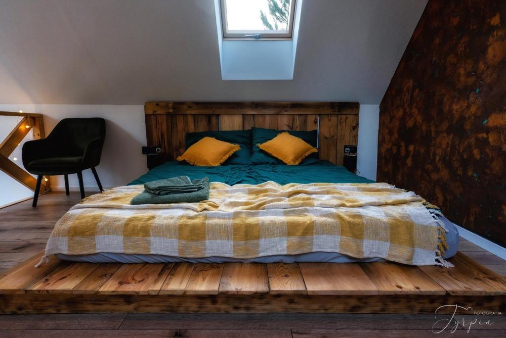 Posteľ alebo postele v izbe v ubytovaní Dziupla House