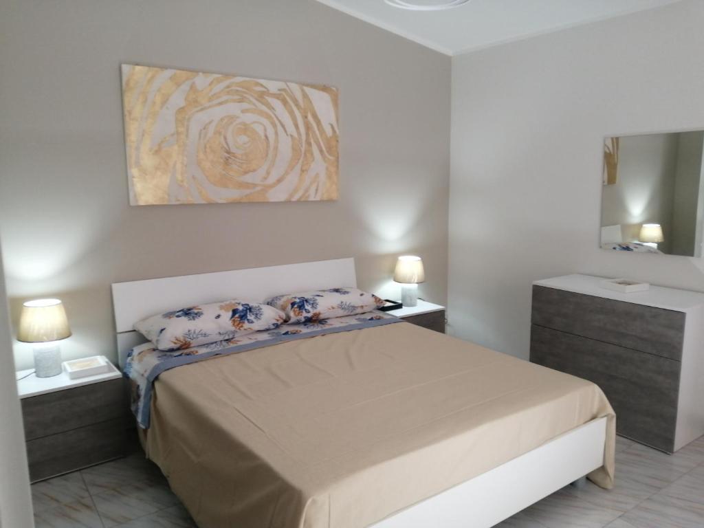 En eller flere senge i et værelse på Casa sul Corso