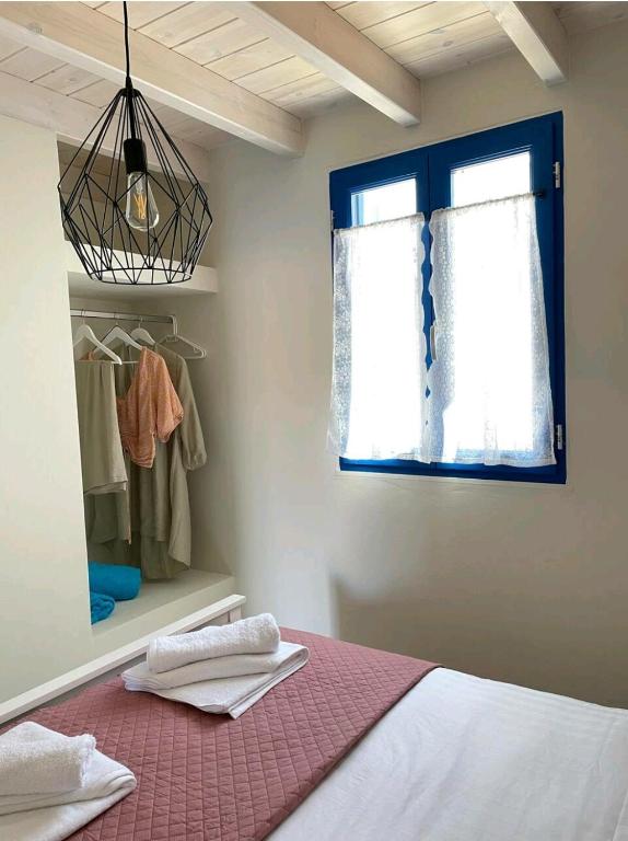 Postel nebo postele na pokoji v ubytování Casa Porphyra