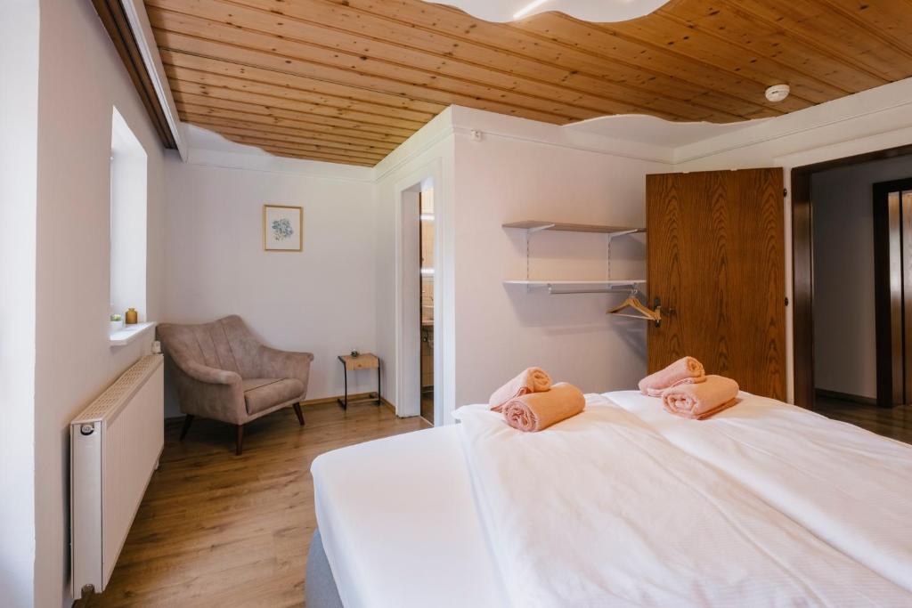 Posteľ alebo postele v izbe v ubytovaní Kaiser Apartments