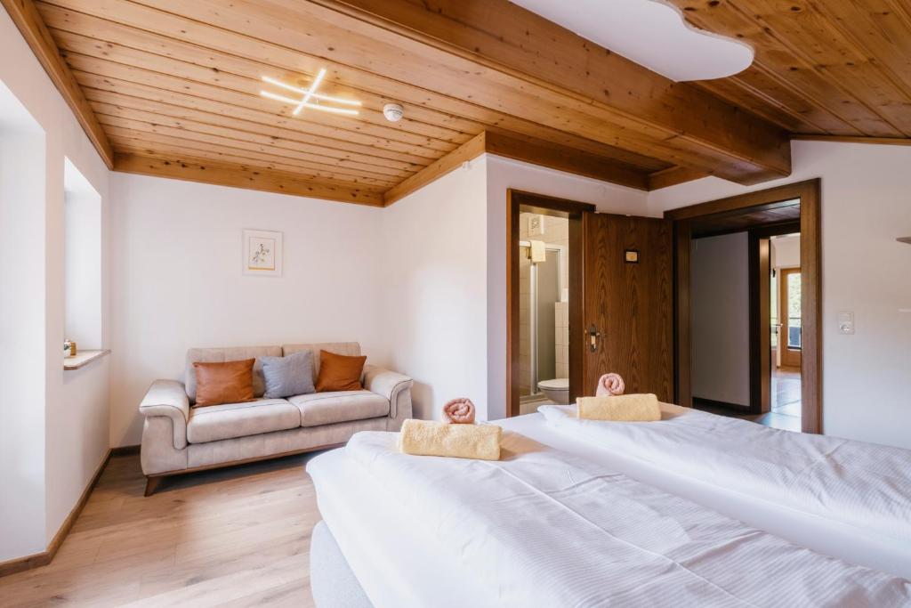 Posteľ alebo postele v izbe v ubytovaní Kaiser Apartments