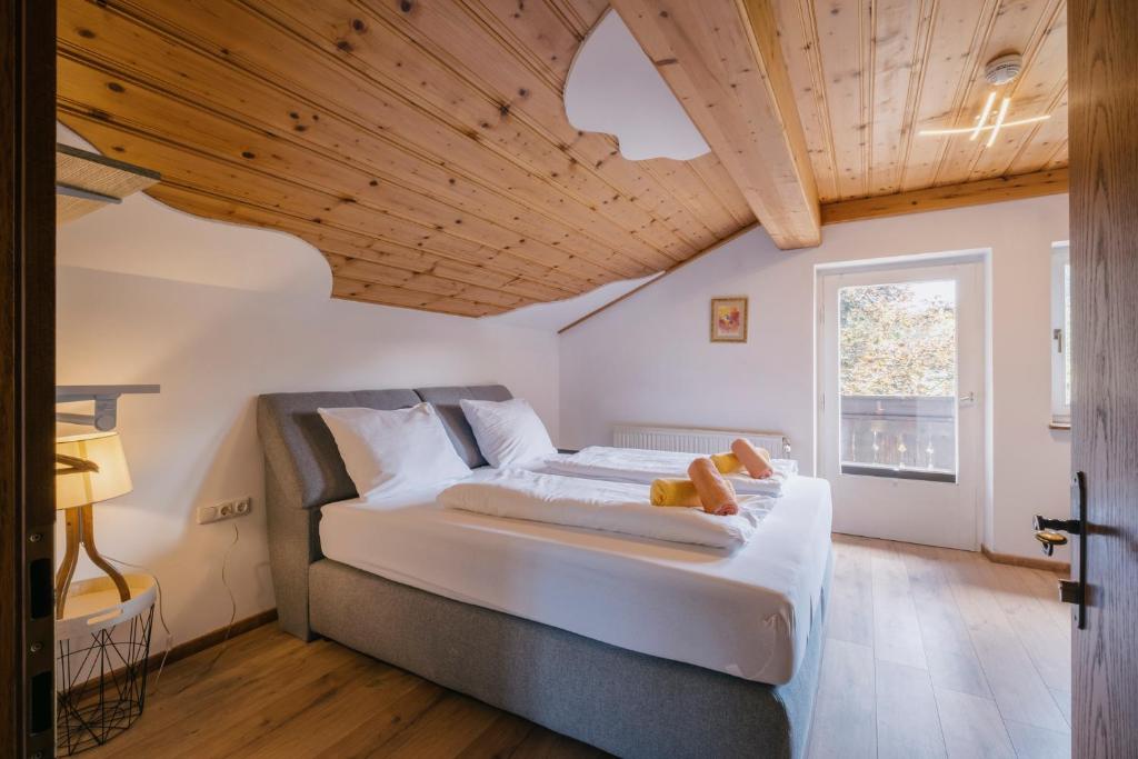 Posteľ alebo postele v izbe v ubytovaní Kaiser Apartments