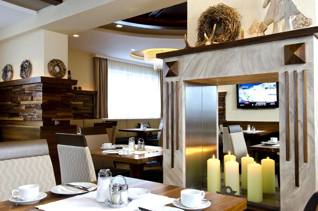 TV a/nebo společenská místnost v ubytování Hotel Garni Astoria