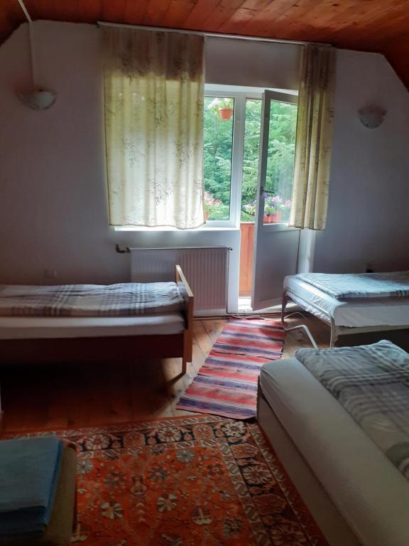 Letto o letti in una camera di Cabana Valea Stanciului