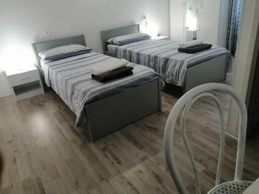Posteľ alebo postele v izbe v ubytovaní Albergo blue fish