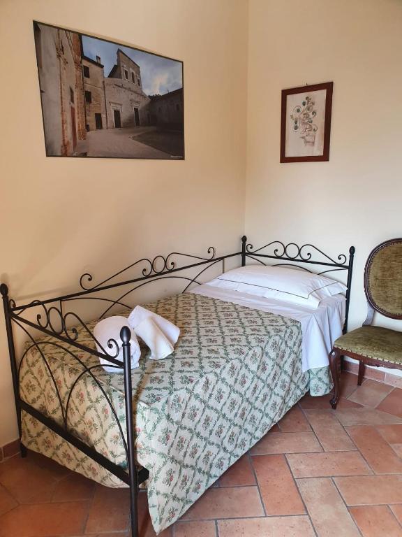 Łóżko lub łóżka w pokoju w obiekcie AGRITURISMO Villino Bellavista