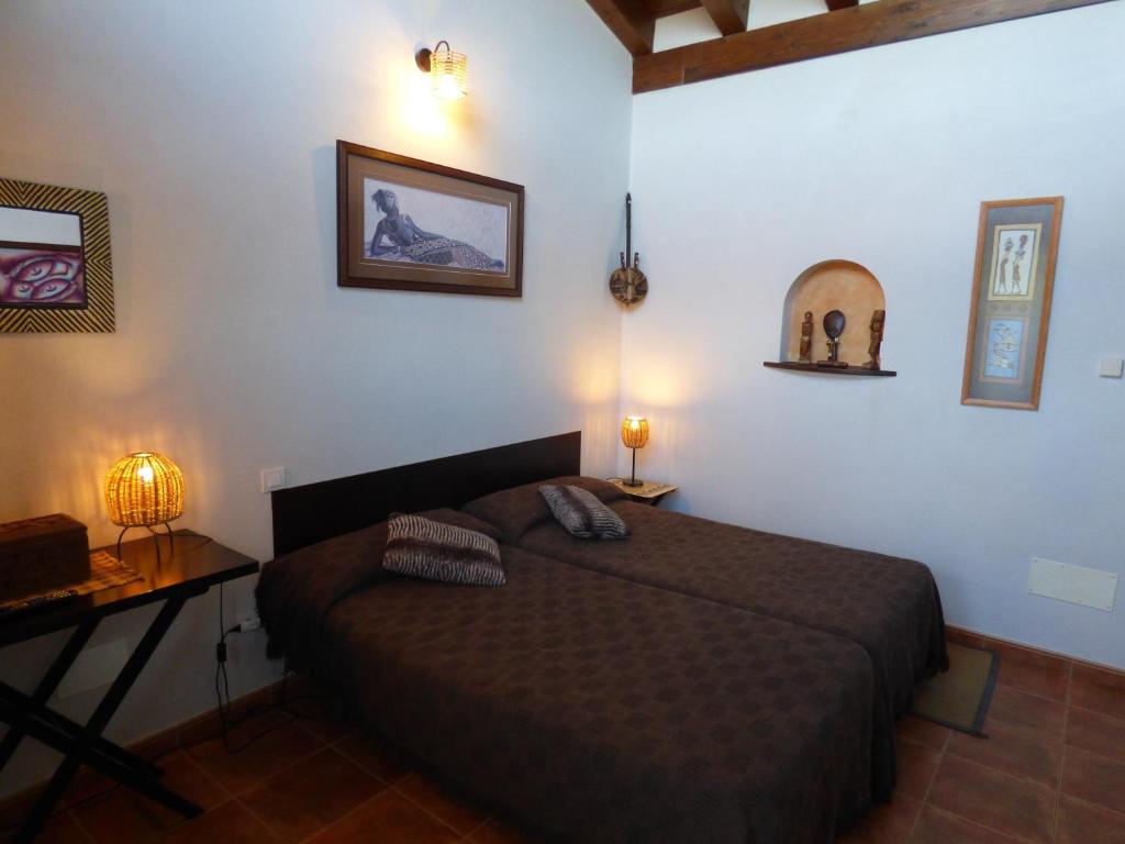 Postel nebo postele na pokoji v ubytování Hotel Albergue Bioclimático Sabinares del Arlanza